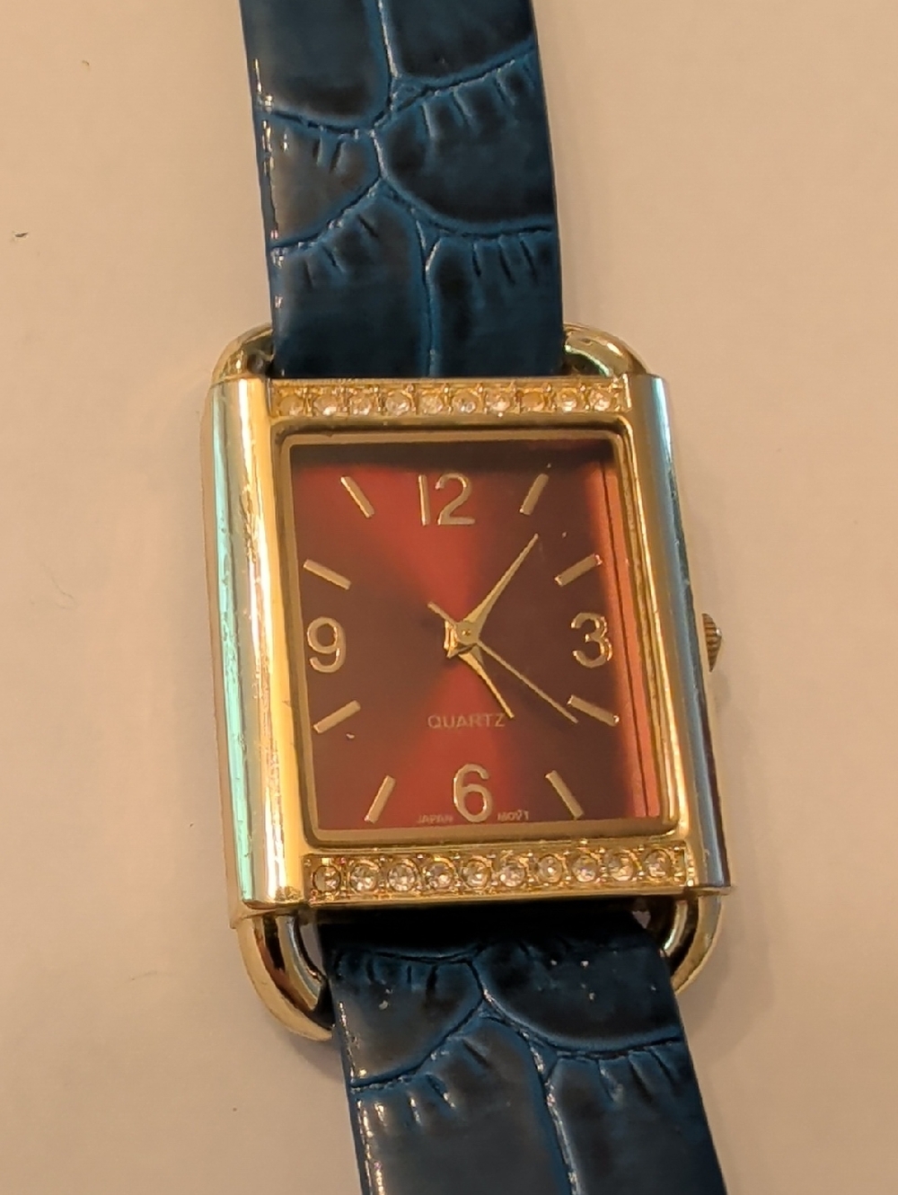 Vintage Blue Strap Gold-Tone Rectangular Watch with Red Dial
